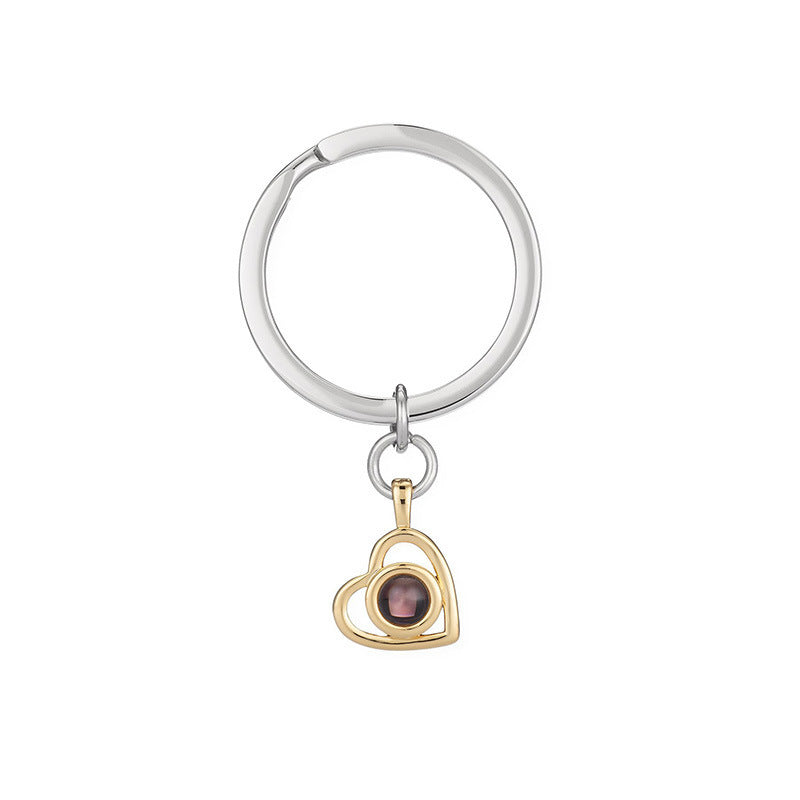 Gold Hidden Photo Keychain on its silver split ring, full view