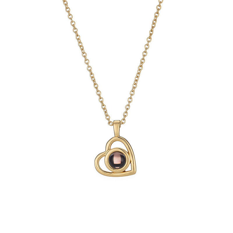 Gold Hidden Photo Necklace, full view of the heart pendant and chain