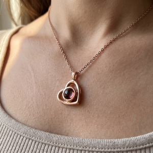 Rose gold Hidden Photo Necklace worn at the collarbone